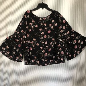 Black floral blouse.